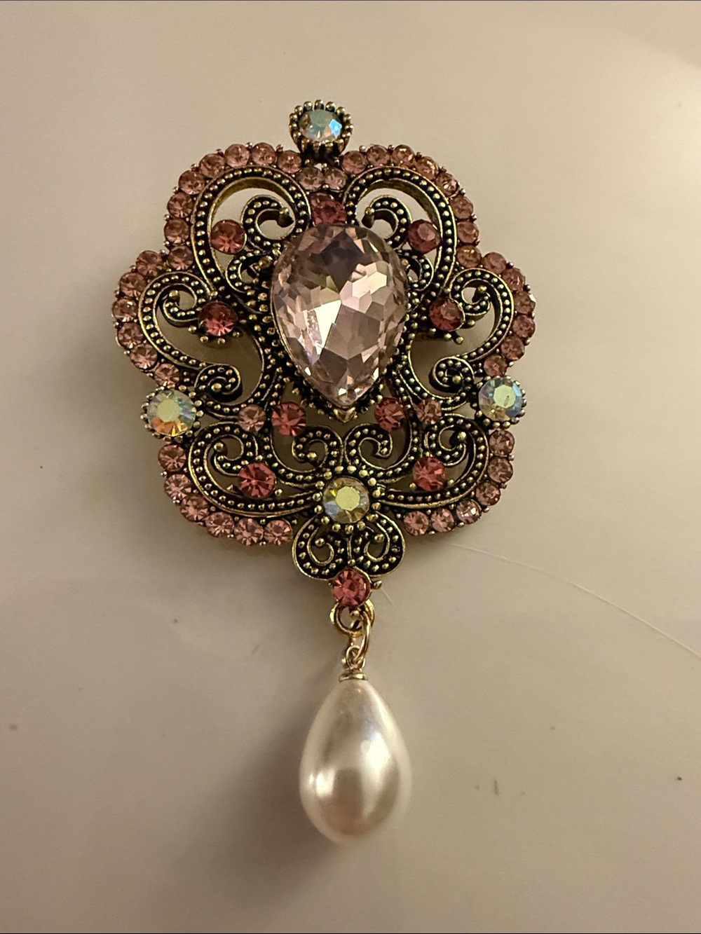 Vintage-Inspired Pink Crystal Brooch with Pearl Drop